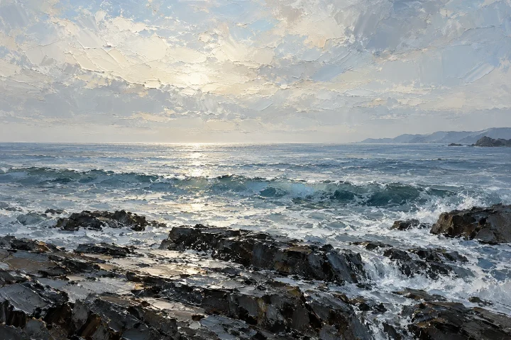 a silver-blue sea under a pale sky, low horizon and dark foreground rocks